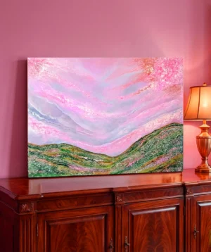 Mountain meadow with pink sky